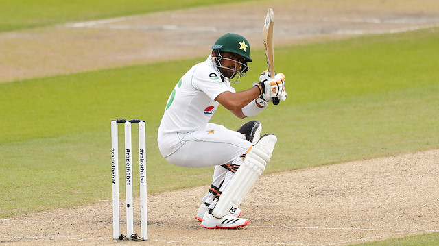 Cricket - First Test - England v Pakistan - Emirates Old Trafford, Manchester, Britain - August 5, 2020 Pakistan's Babar Azam in action, as play resumes behind closed doors following the outbreak of the coronavirus disease (COVID-19) REUTERS/Lee Smith/Pool

