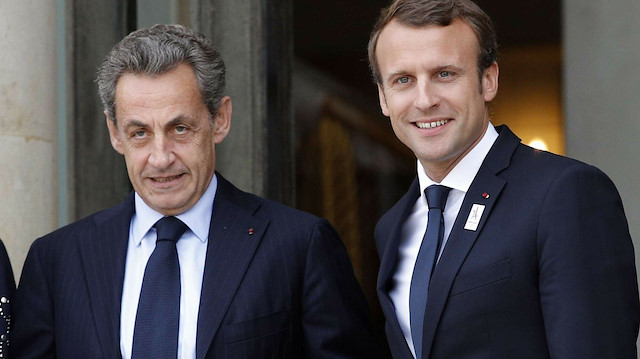 Eski Fransa Cumhurbaşkanı Nicolas Sarkozy ve Fransa Cumhurbaşkanı Emmanuel Macron 