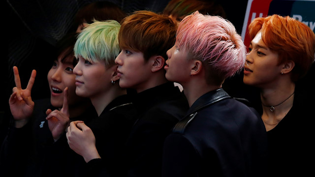 FILE PHOTO: Members of South Korean K-Pop band BTS react on the red carpet during 2015 Mnet Asian Music Awards (MAMA) in Hong Kong, China, December 2, 2015. REUTERS/Bobby Yip/File Photo  