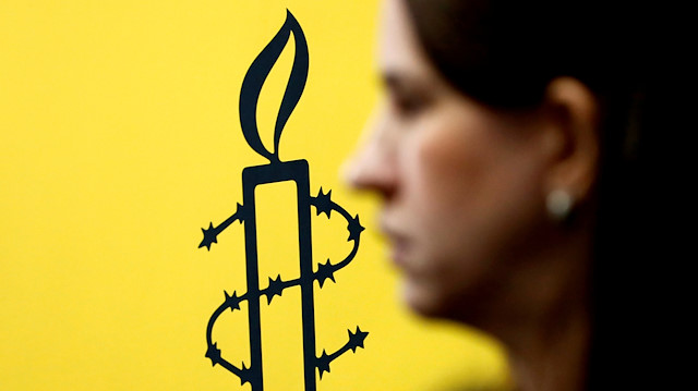 The logo of Amnesty International