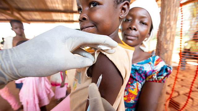 A child is given a measles vaccination during an emergency campaign run by Doctors Without Borders (MSF) in Likasa, Mongala province in northern Democratic Republic of Congo March 3, 2020. Picture taken March 3, 2020.