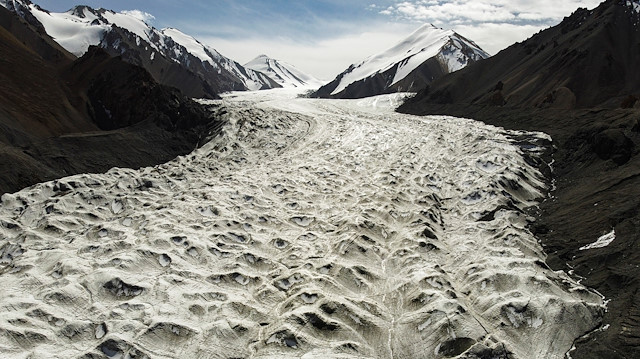 Meltwater flows over the Laohugou No. 12 glacier in the Qilian mountains, Subei Mongol Autonomous County in Gansu province, China, September 27, 2020. 