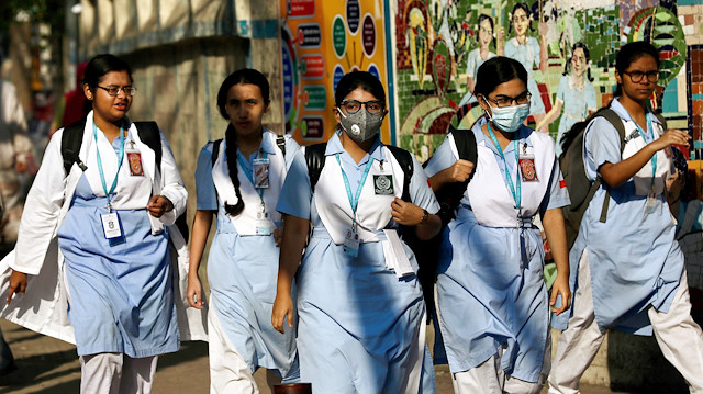 School girls wear masks as a protective measure