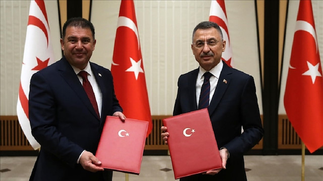Turkish Vice President Fuat Oktay (R) and Turkish Cypriot Prime Minister Ersan Saner (L) attend the signing ceremony of the “Turkey-North Cyprus 2021 Economic and Financial Cooperation Agreement” in Ankara, Turkey on March 03, 2021. ( Arda Küçükkaya - Anadolu Agency )