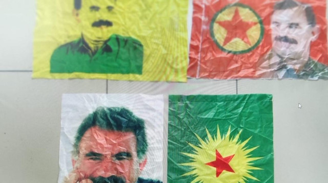 Yapılan aramada, PKK/KCK elebaşı Abdullah Öcalan fotoğrafları ele geçirildi. 
