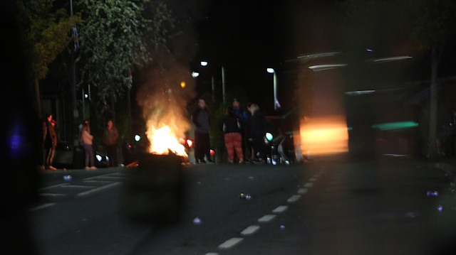 Rioters set car on fire, attack police in Northern Ireland