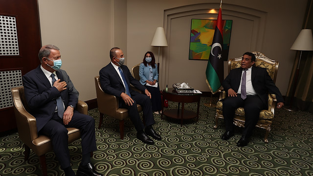 Milli Savunma Bakanı Hulusi Akar, Dışişleri Bakanı Mevlüt Çavuşoğlu ve Libya Başkanlık Konseyi Başkanı el-Menfi