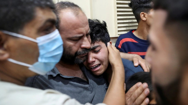 İşgalci İsrail'in abluka altındaki Gazze Şeridi'ne düzenlediği saldırılarda 14'ü çocuk, 5'i kadın olmak üzere en az 56 Filistinli şehit olmuş, 335 kişi yaralanmıştı.