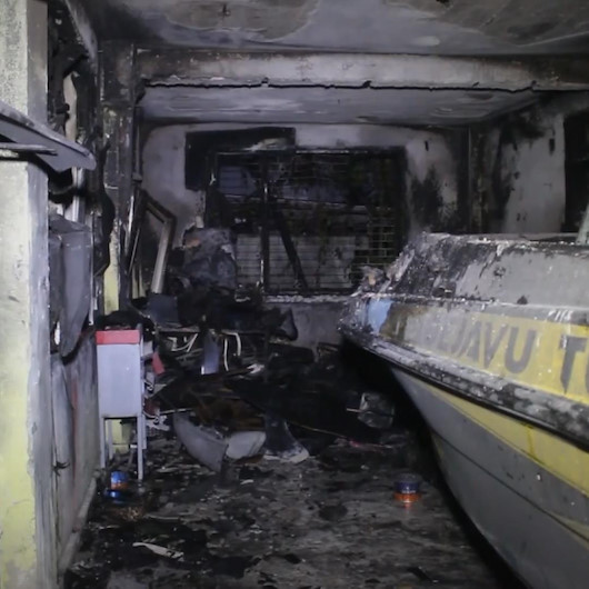 Adanada oto tamirci dükkanında çıkan yangın söndürüldü