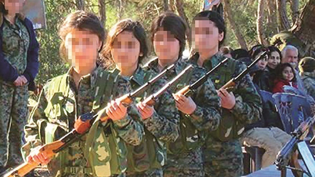 14 yaşına kadar örgüt üyesi ailelerin yanında kalan çocuklar, sonra silahlı eğitime alınıyor.