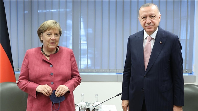 أردوغان يلتقي المستشارة الألمانية على هامش قمة الناتو