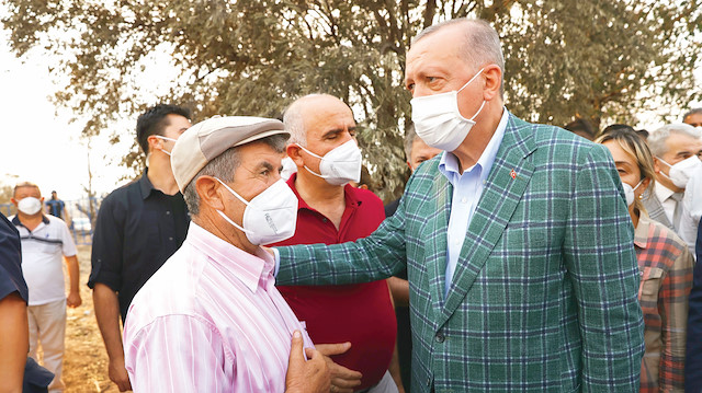 Cumhurbaşkanı Erdoğan, Manavgat'ta orman yangınından etkilenen vatandaşlara geçmiş olsun dileklerini iletti.
