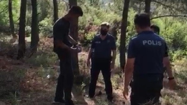 Ahmet A. ormanlık alanda yine tiner şişesiyle yakalandı.