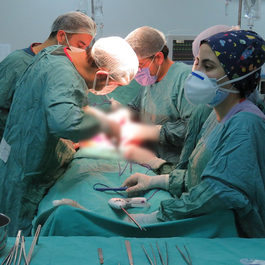 Karnından 35 kilo tümör çıktı