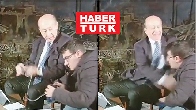 Gazeteci Muharrem Sarıkaya'nın kameramana tokat attığı an böyle görüntülendi.