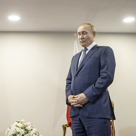 Cumhurbaşkanı Erdoğan'ı bekleyen Putin uzun süre etrafı inceledi