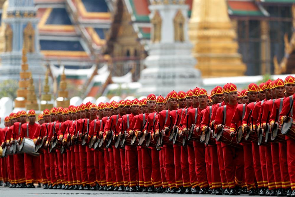 Drummers take a part in the royal cremation procession of late King Bhumibol Adulyadej at the Grand Palace in Bangkok, Thailand.