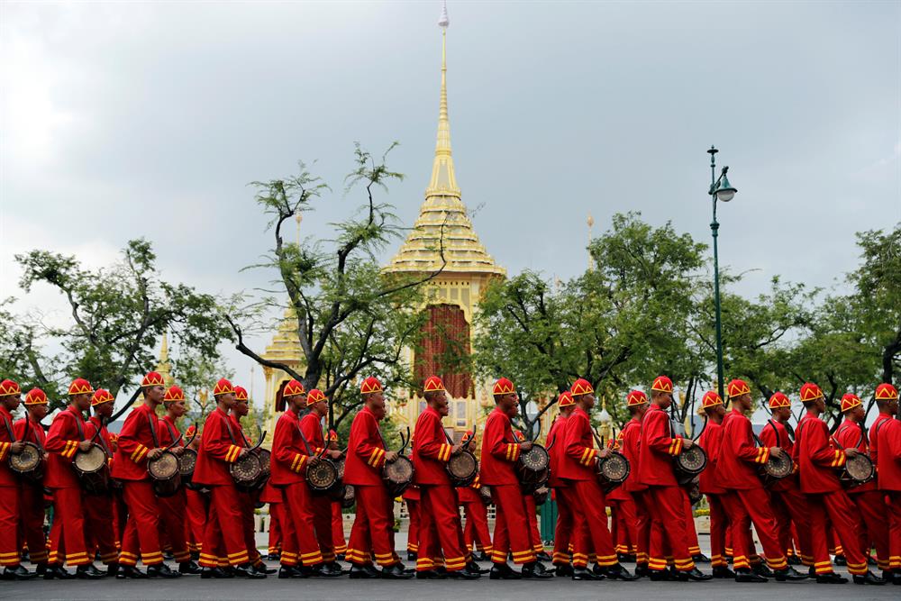 Drummers take part in the royal cremation procession of late King Bhumibol Adulyadej in Bangkok, Thailand.