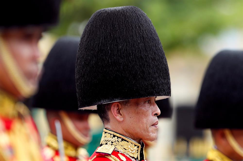 Thailand's King Maha Vajiralongkorn takes part in the royal cremation procession of late King Bhumibol Adulyadej at the Grand Palace in Bangkok, Thailand.
