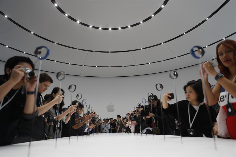 Apple unveils three new iPhones, smartwatch