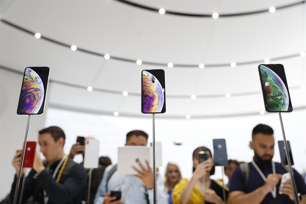 Apple unveils three new iPhones, smartwatch