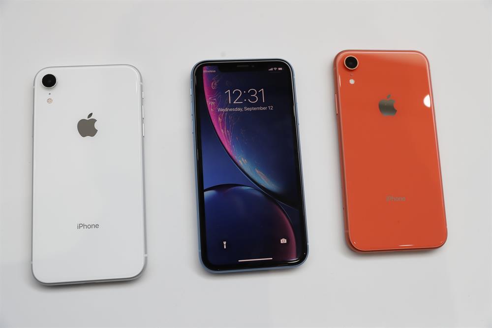 Apple unveils three new iPhones, smartwatch