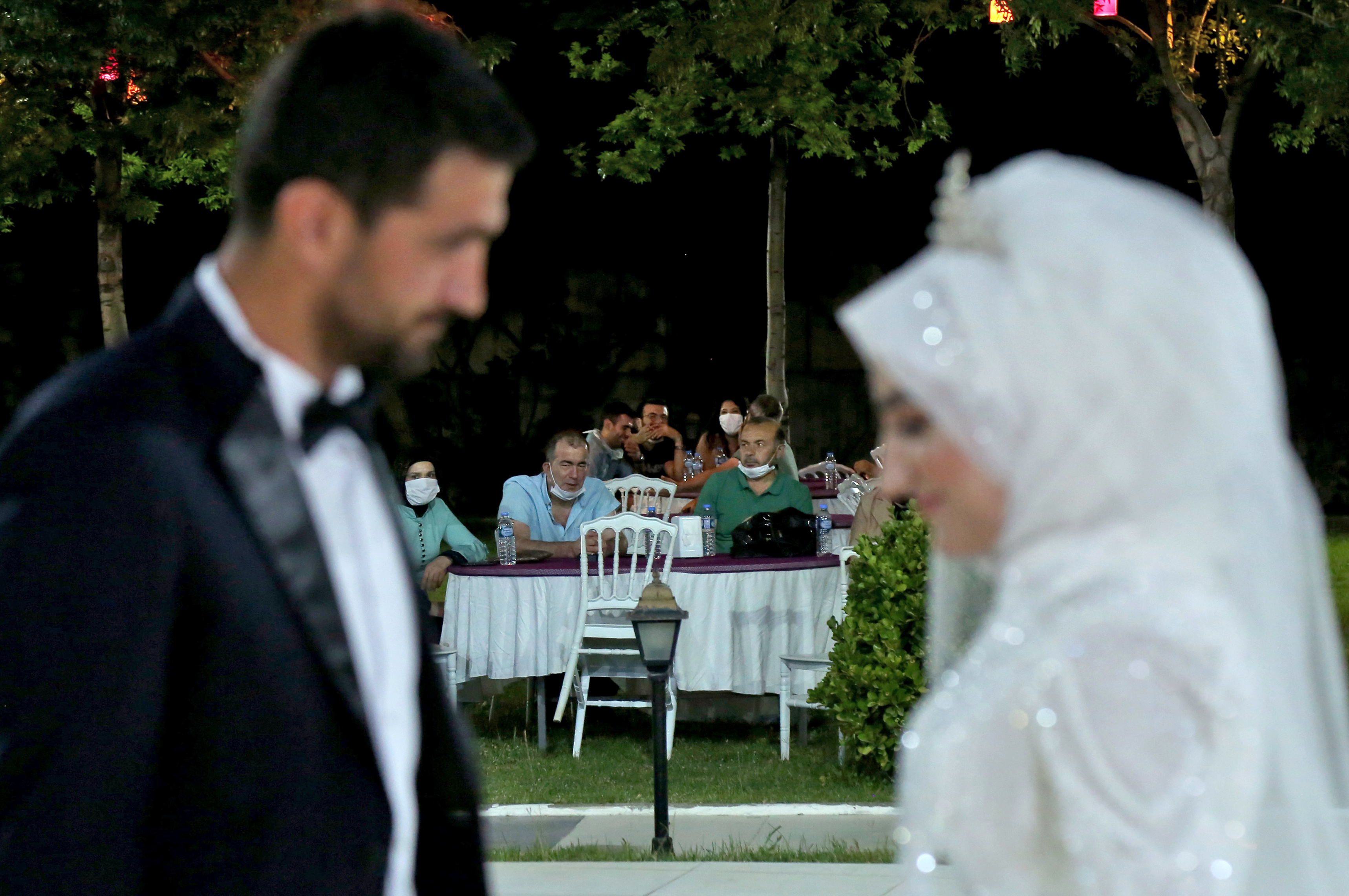 You may not kiss the bride! Turkey's wedding halls reopen- but with a twist