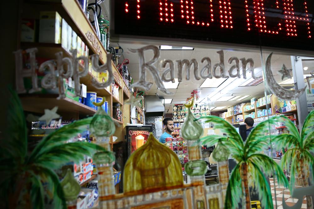 American muslims buy goods as part of preparations for the Holy Month of Ramadan in Bayridge neighbourhood in Brooklyn borough of New York, United States on May 24, 2017.