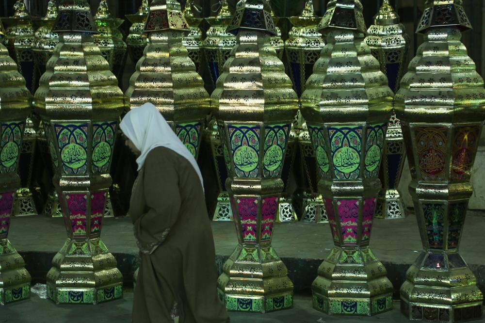 Craftsman Nasir Mohammad makes a Fanous lamp (Ramadan Lantern) at a market ahead of Muslims' Holy Month of Ramadan at Sayyida Zaynab district of Cairo in Egypt on May 17, 2017. The traditional use of fanous as decorations and people hold fanous to celebrate during the holy month of Ramadan.