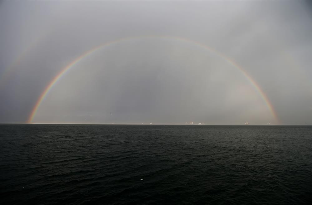Vibrant rainbow forms over Izmir after rain