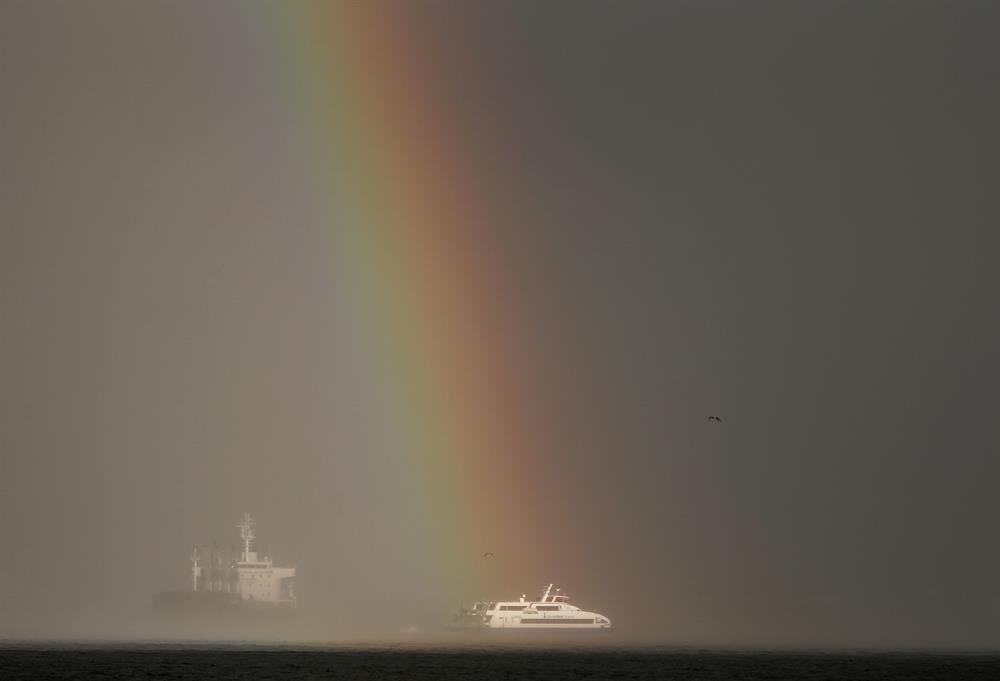 Vibrant rainbow forms over Izmir after rain
