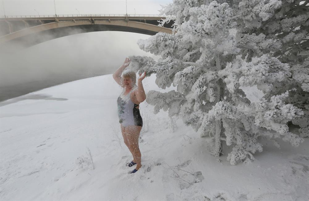 Snowy landscapes on the bank of the Yenisei River in the Siberian Taiga area, with the air temperature at about minus 35 degrees Celsius (minus 31 degrees Fahrenheit), outside Krasnoyarsk, Russia