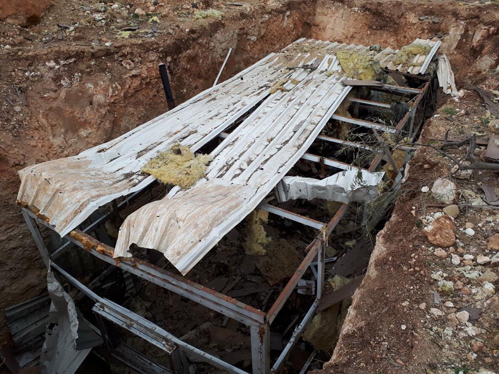 A ditch, which was dug by PYD/PKK terrorists, is seen at the region after Turkish Armed Forces and Free Syrian Army cleared Nisriyye village of Afrin from PYD/PKK terrorists within the "Operation Olive Branch", launched in Syria's Afrin region, on February 9, 2018 in Aleppo's Afrin, Syria. Turkey launched Operation Olive Branch on January 20 in Syria’s northwestern Afrin region; the aim of the operation is to establish security and stability along Turkish borders and the region as well as to eliminate PKK/KCK/PYD-YPG and Daesh terror groups, and protect the Syrian people from the oppression and cruelty of terrorists.