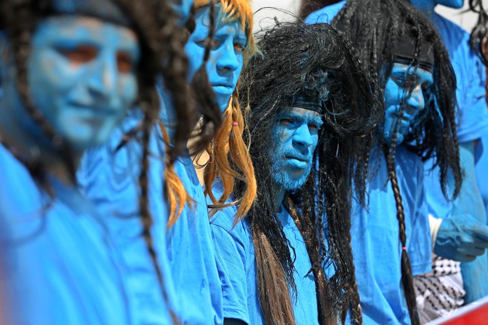 Palestinians dressed as Avatar characters protest near Gaza-Israel border