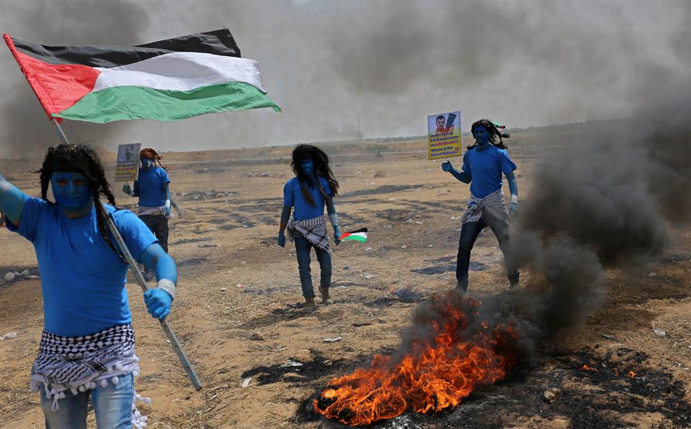 Palestinians dressed as Avatar characters protest near Gaza-Israel border