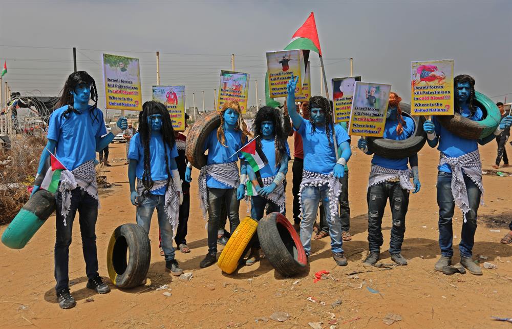 Palestinians dressed as Avatar characters protest near Gaza-Israel border