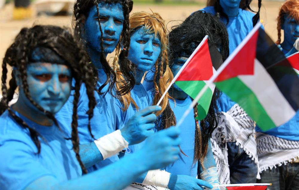 Palestinians dressed as Avatar characters protest near Gaza-Israel border