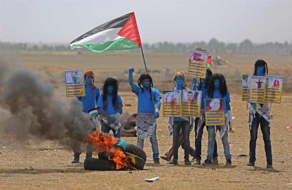 Palestinians dressed as Avatar characters protest near Gaza-Israel border