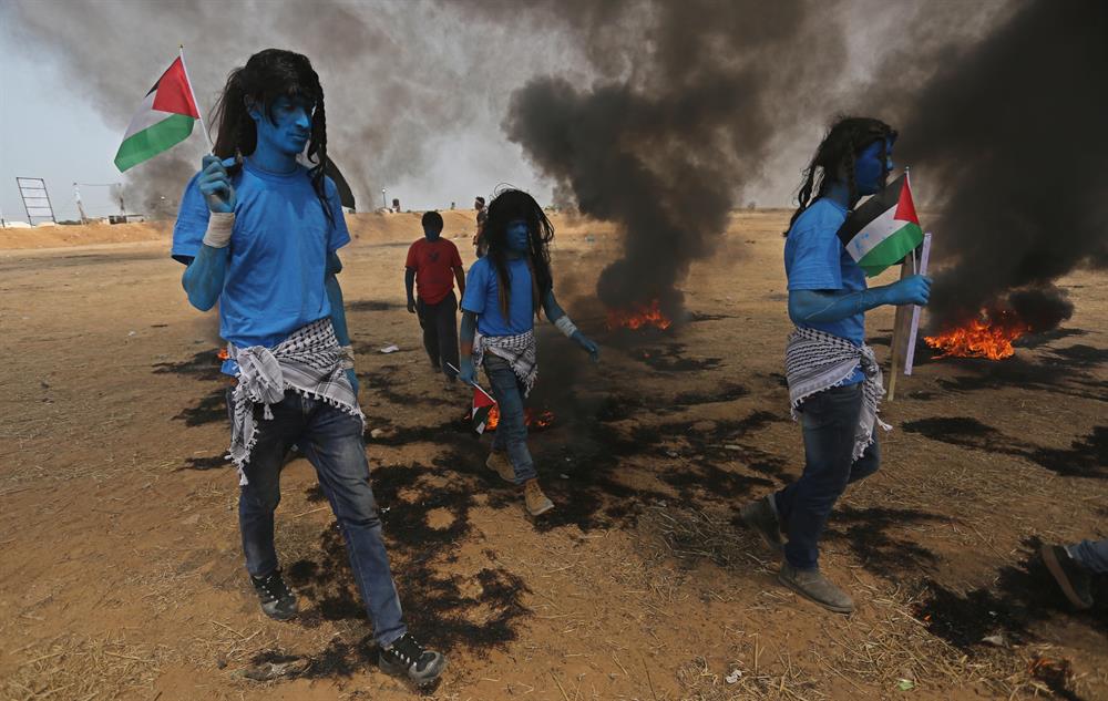 Palestinians dressed as Avatar characters protest near Gaza-Israel border