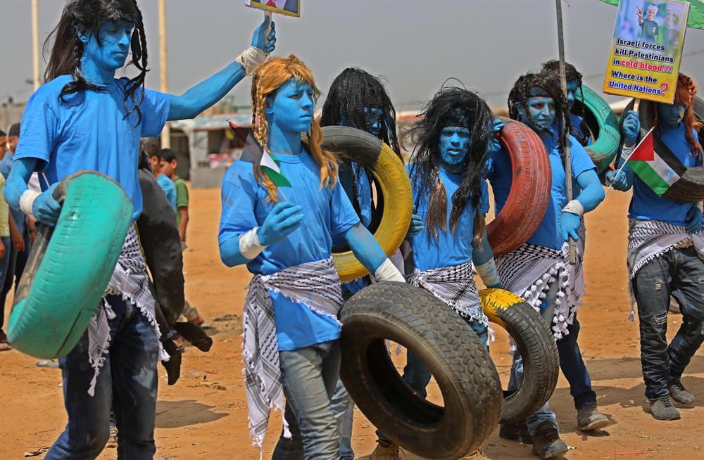 Palestinians dressed as Avatar characters protest near Gaza-Israel border