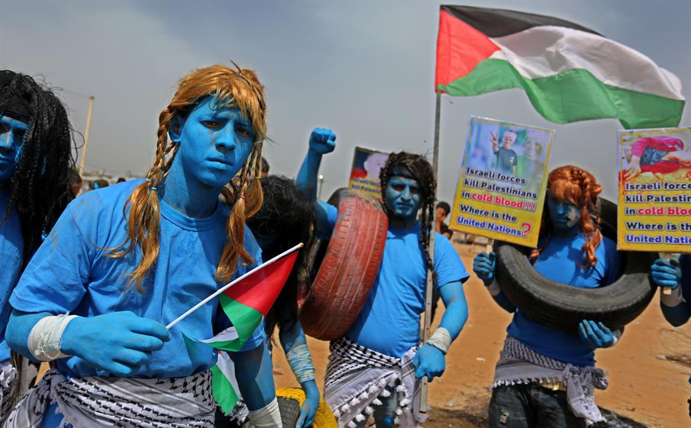Palestinians dressed as Avatar characters protest near Gaza-Israel border