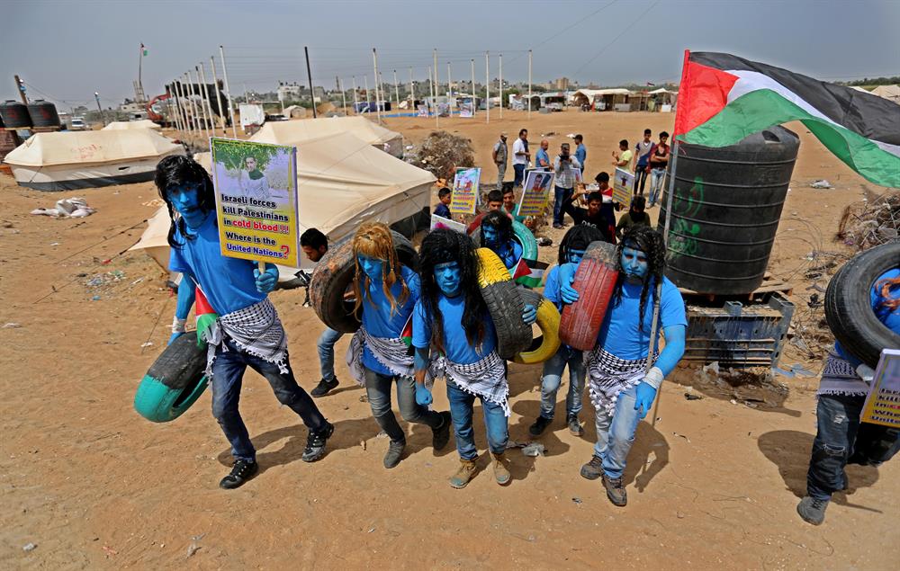 Palestinians dressed as Avatar characters protest near Gaza-Israel border