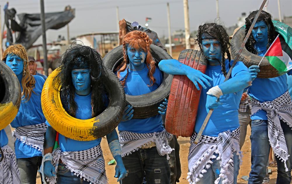 Palestinians dressed as Avatar characters protest near Gaza-Israel border