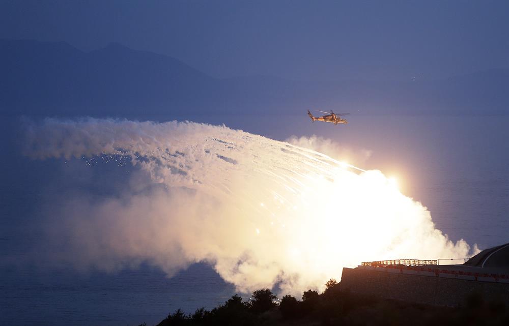 Turkish ATAK helicopter pounds targets during EFES 2018 military drills