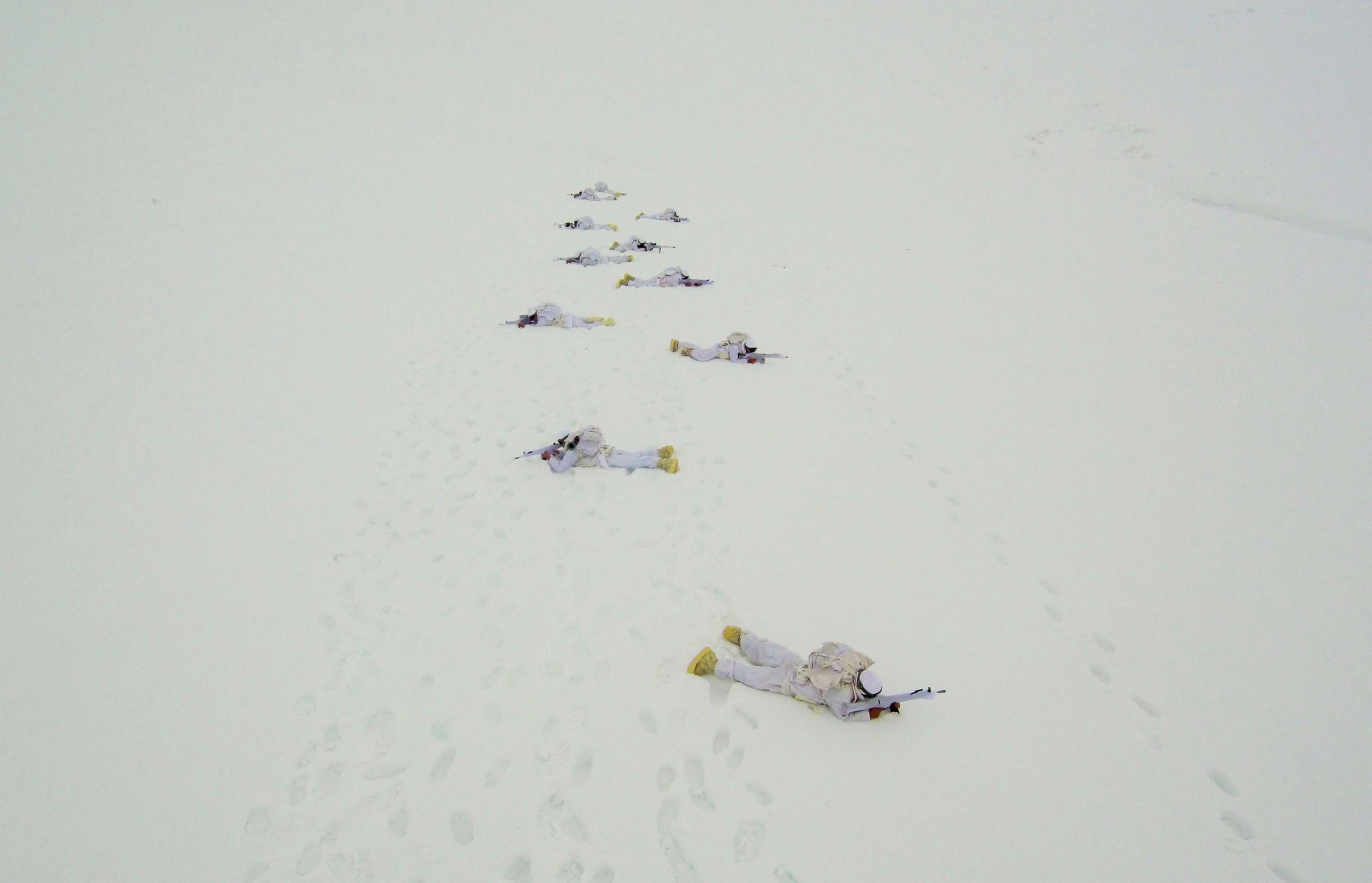 A drone photo shows an eerial view of Turkish Gendarmerie Special Operation and Commando Unit singing commando anthem after conducting search operation against PKK terrorist organization, in Mus, Turkey on December 03, 2018.  