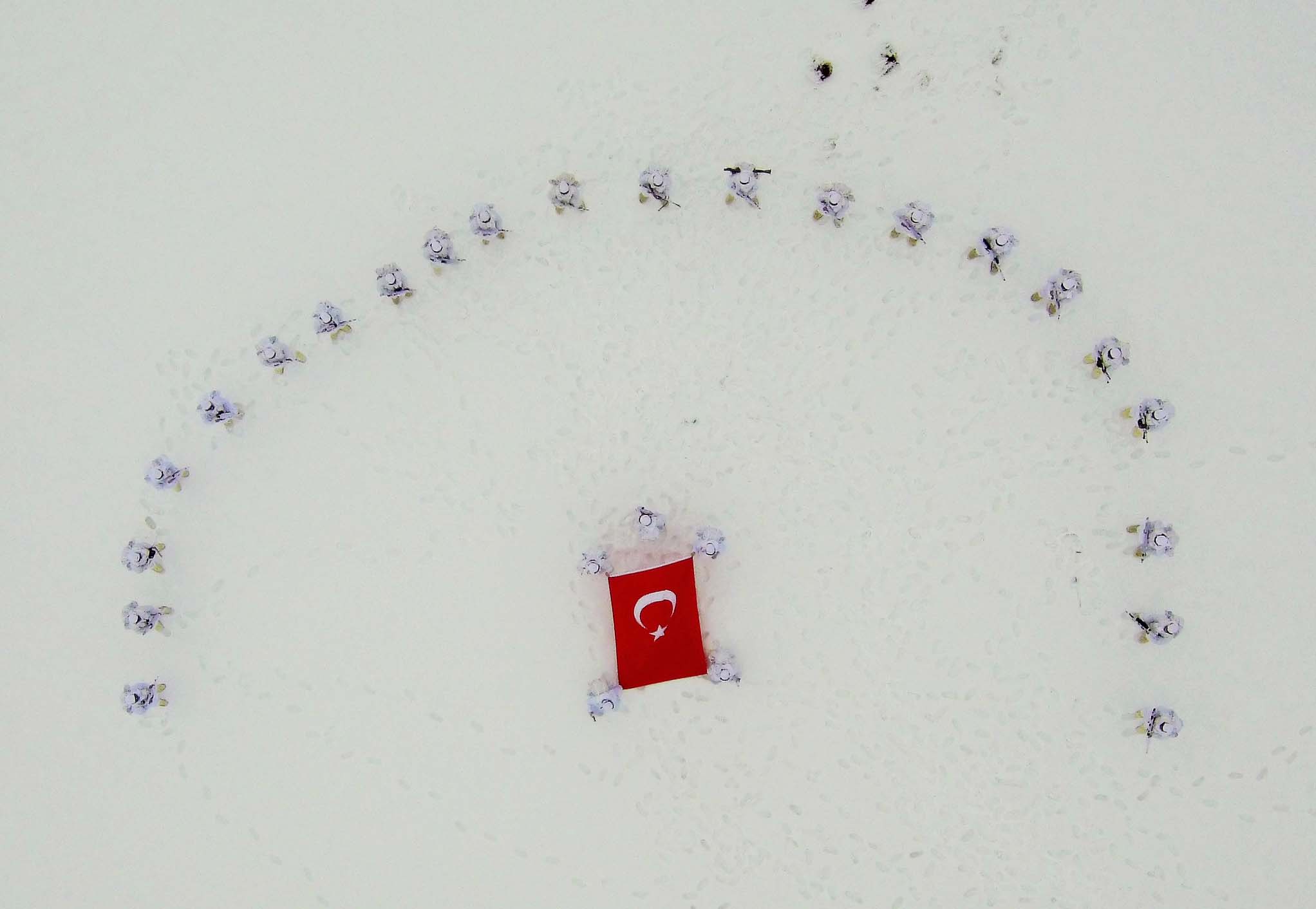 A drone photo shows an eerial view of Turkish Gendarmerie Special Operation and Commando Unit singing commando anthem after conducting search operation against PKK terrorist organization, in Mus, Turkey on December 03, 2018.  