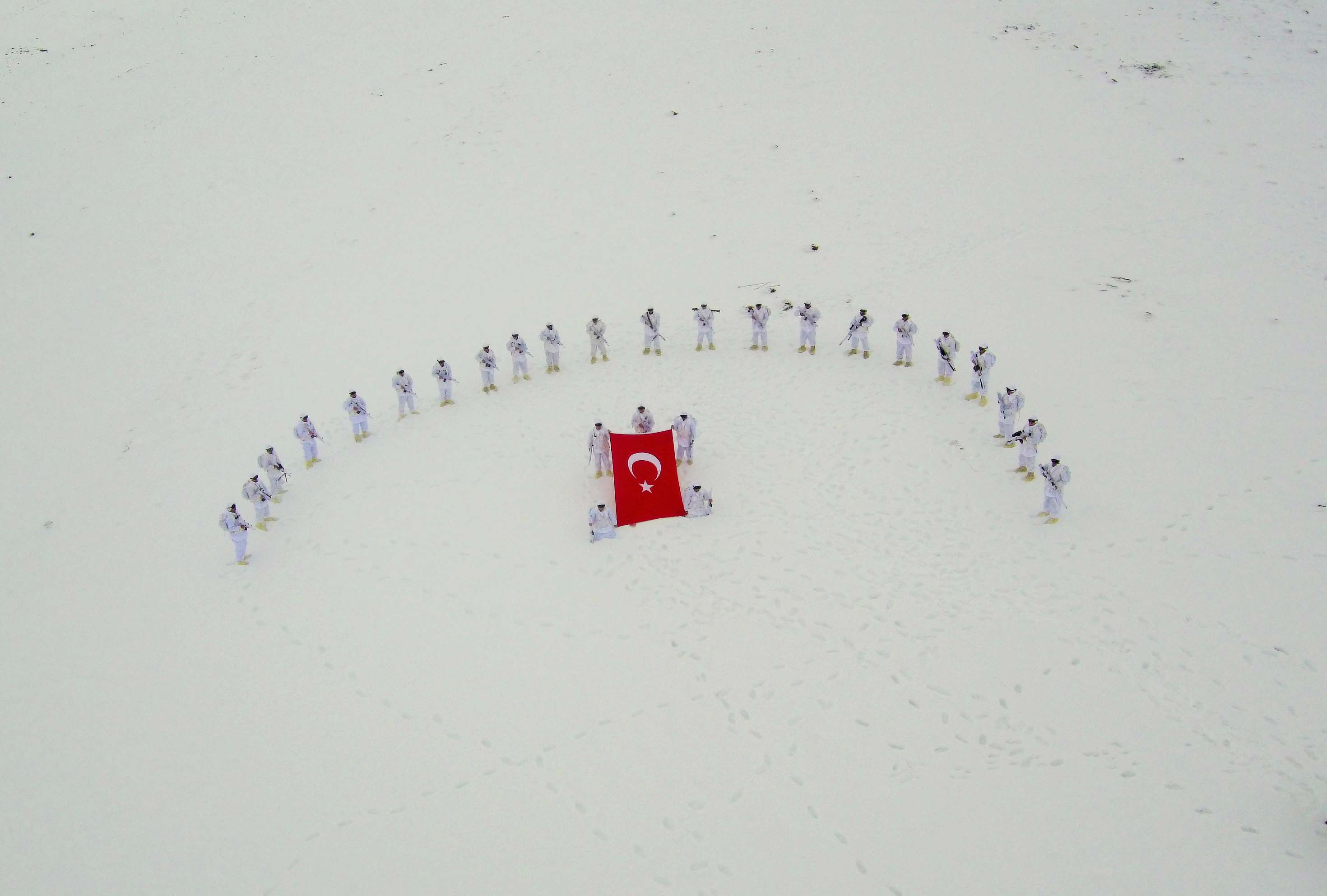 A drone photo shows an eerial view of Turkish Gendarmerie Special Operation and Commando Unit singing commando anthem after conducting search operation against PKK terrorist organization, in Mus, Turkey on December 03, 2018.  