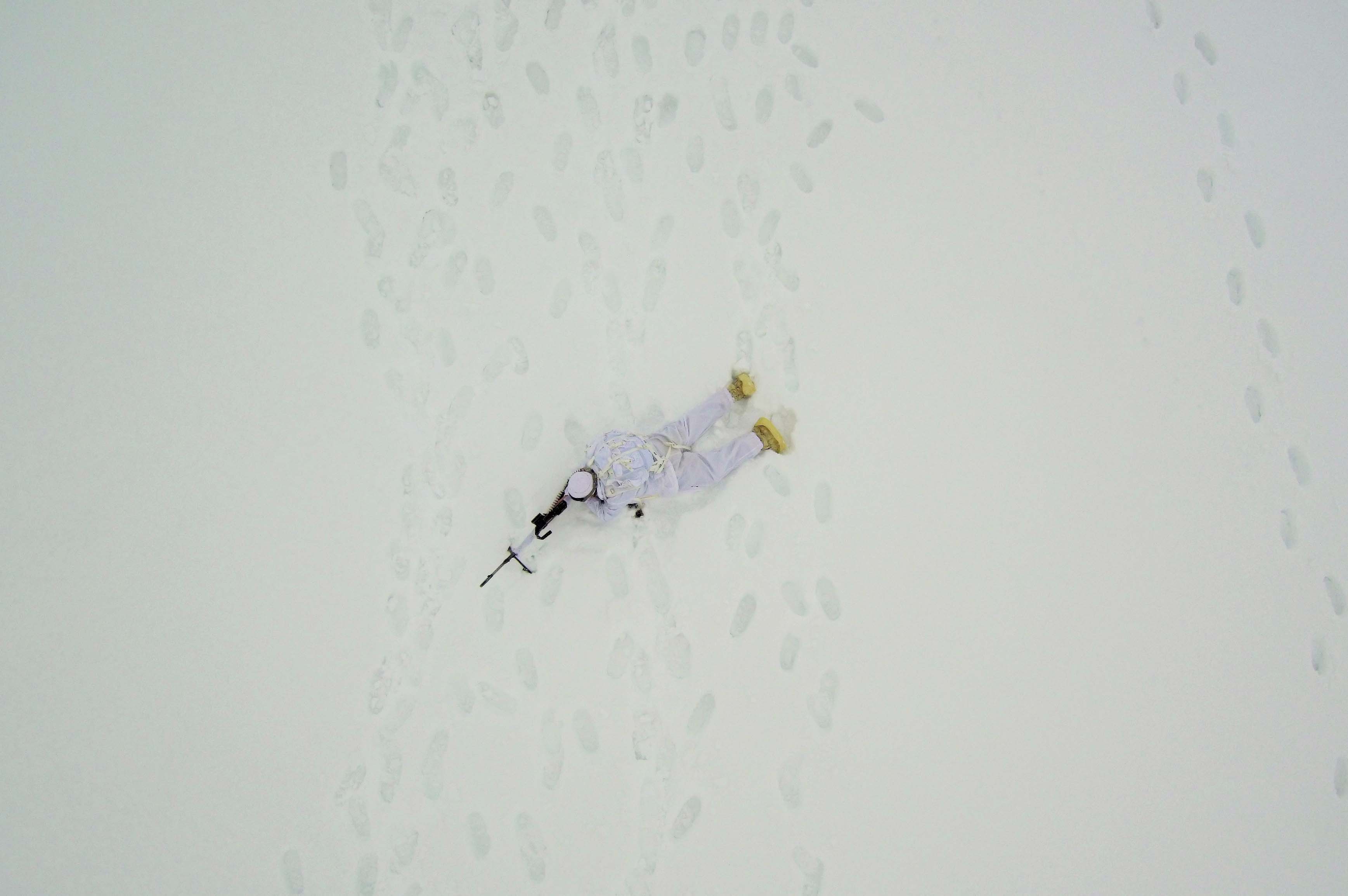 A drone photo shows an eerial view of Turkish Gendarmerie Special Operation and Commando Unit singing commando anthem after conducting search operation against PKK terrorist organization, in Mus, Turkey on December 03, 2018.  