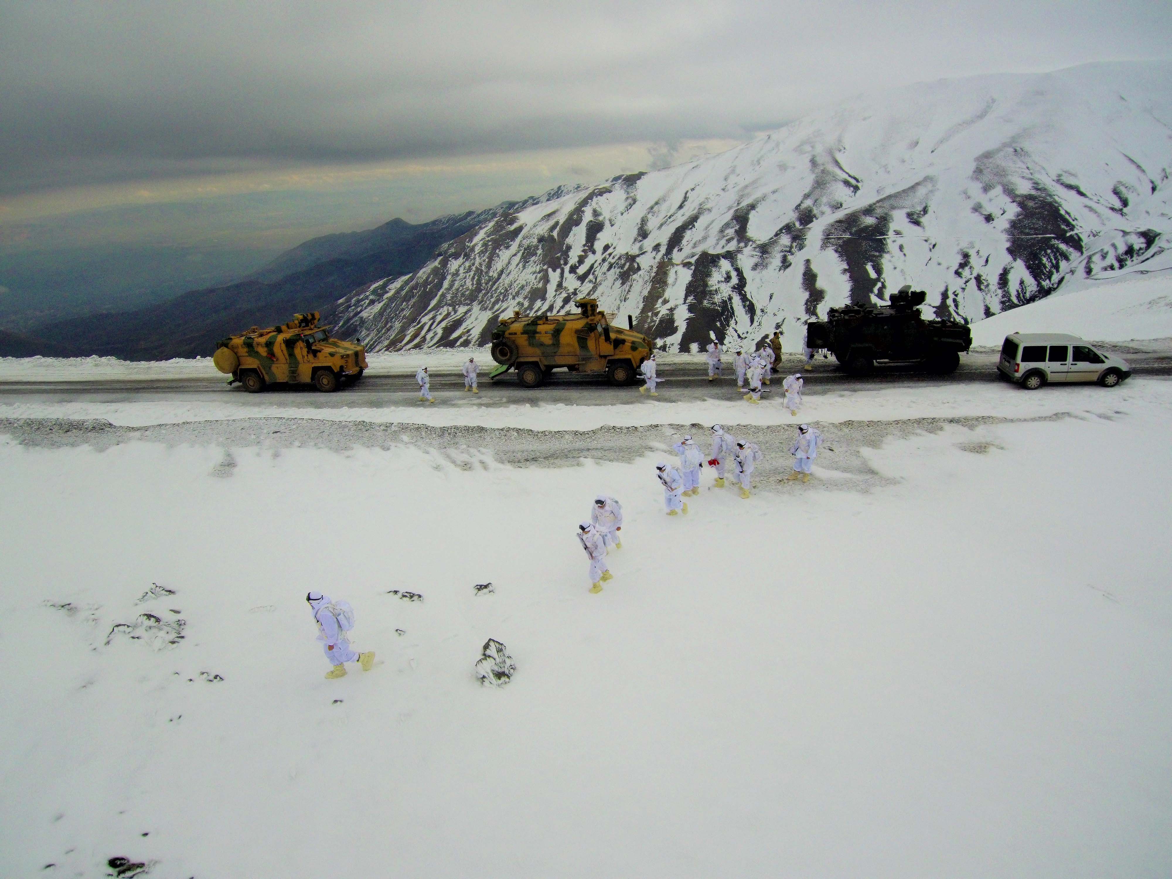 A drone photo shows an eerial view of Turkish Gendarmerie Special Operation and Commando Unit singing commando anthem after conducting search operation against PKK terrorist organization, in Mus, Turkey on December 03, 2018.  