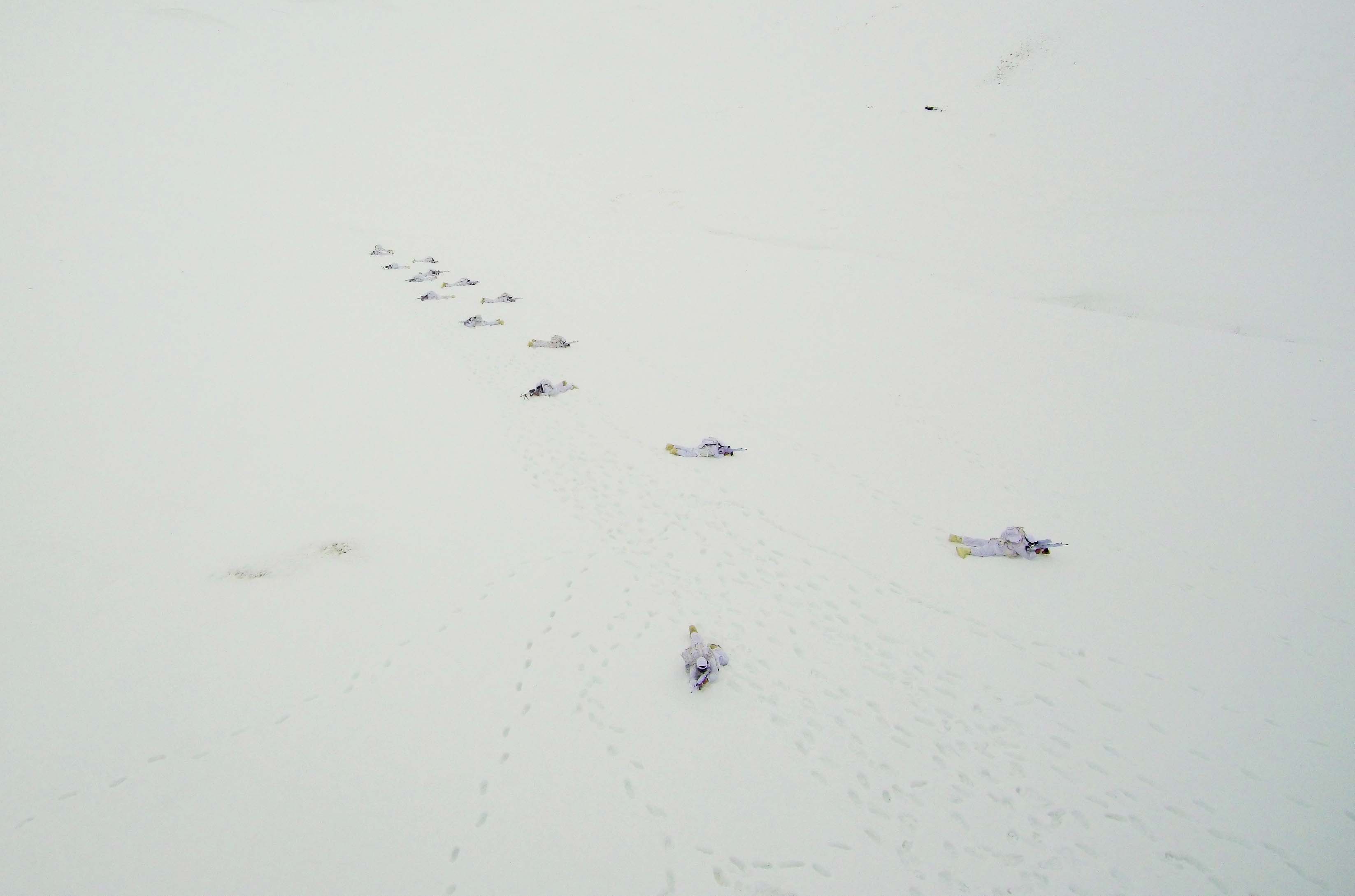 A drone photo shows an eerial view of Turkish Gendarmerie Special Operation and Commando Unit singing commando anthem after conducting search operation against PKK terrorist organization, in Mus, Turkey on December 03, 2018.  